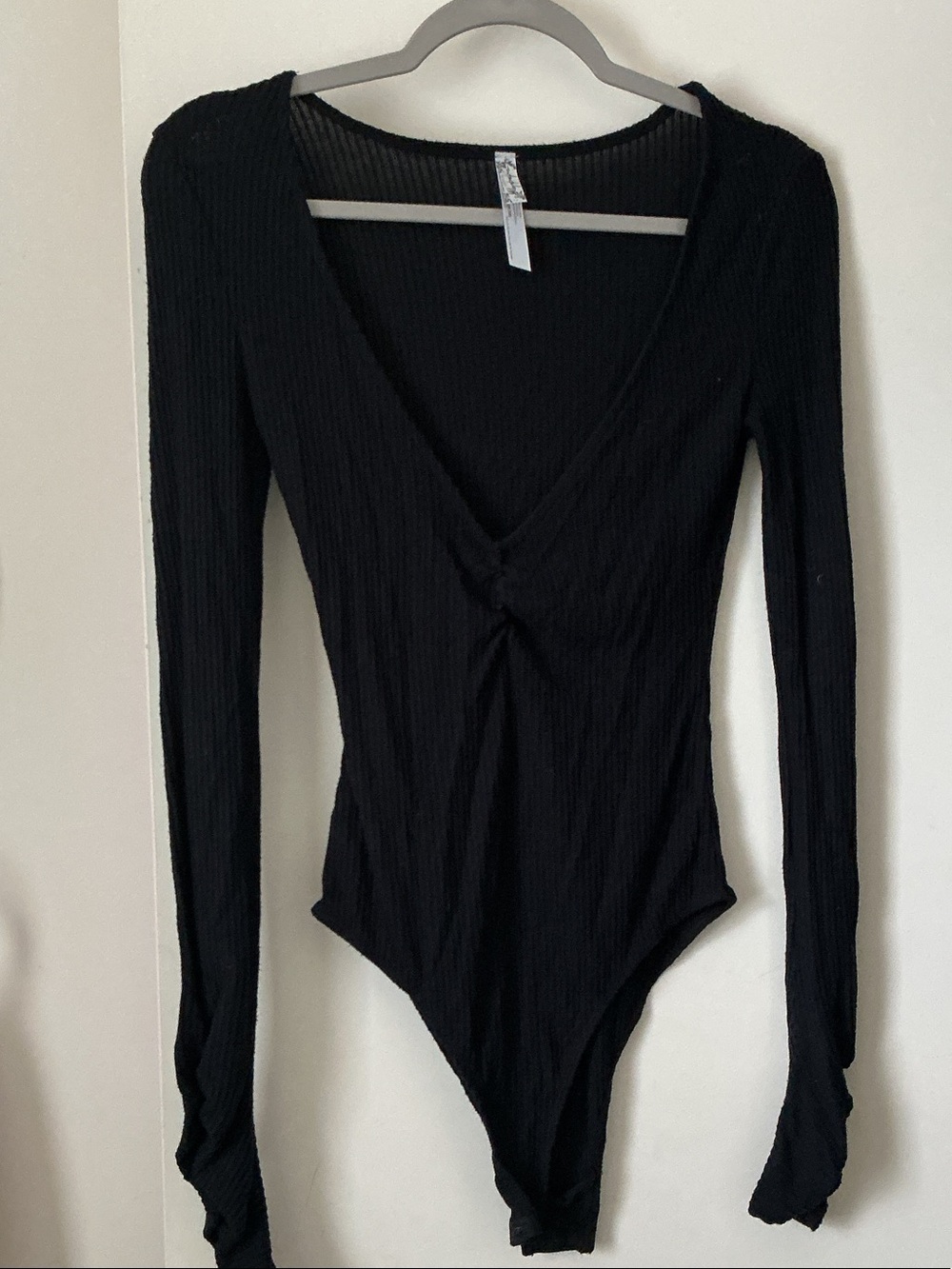 Black Ribbed Long Sleeve Bodysuit from FREE PEOPLE